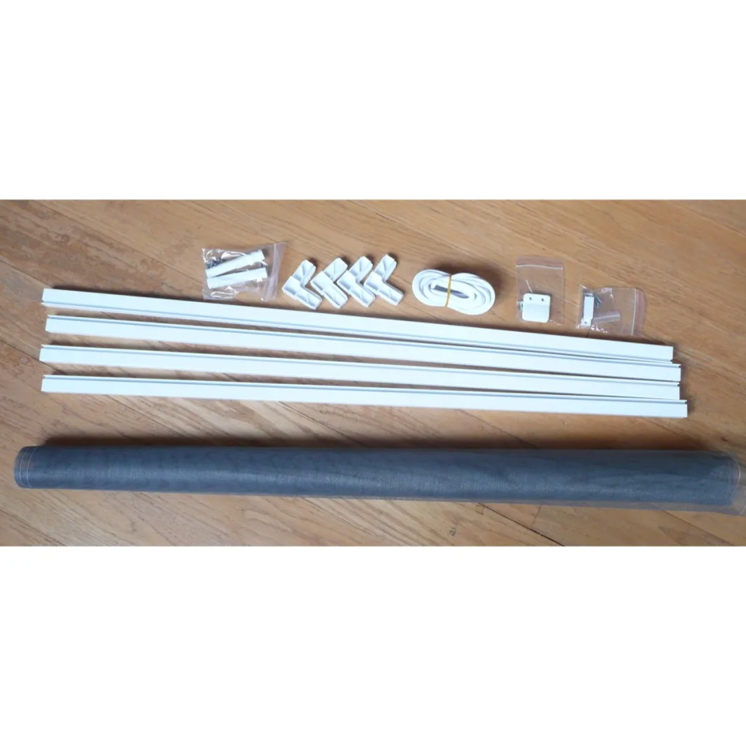 Hinged window frame kit contents: aluminium profiles, corners, mesh, spline, hinges and magnetic catch