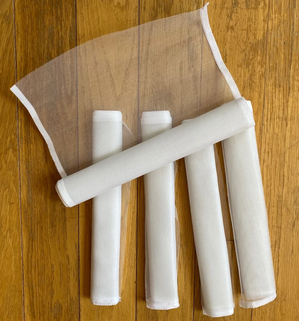 Replacement white insect screen panels, sold as a pair