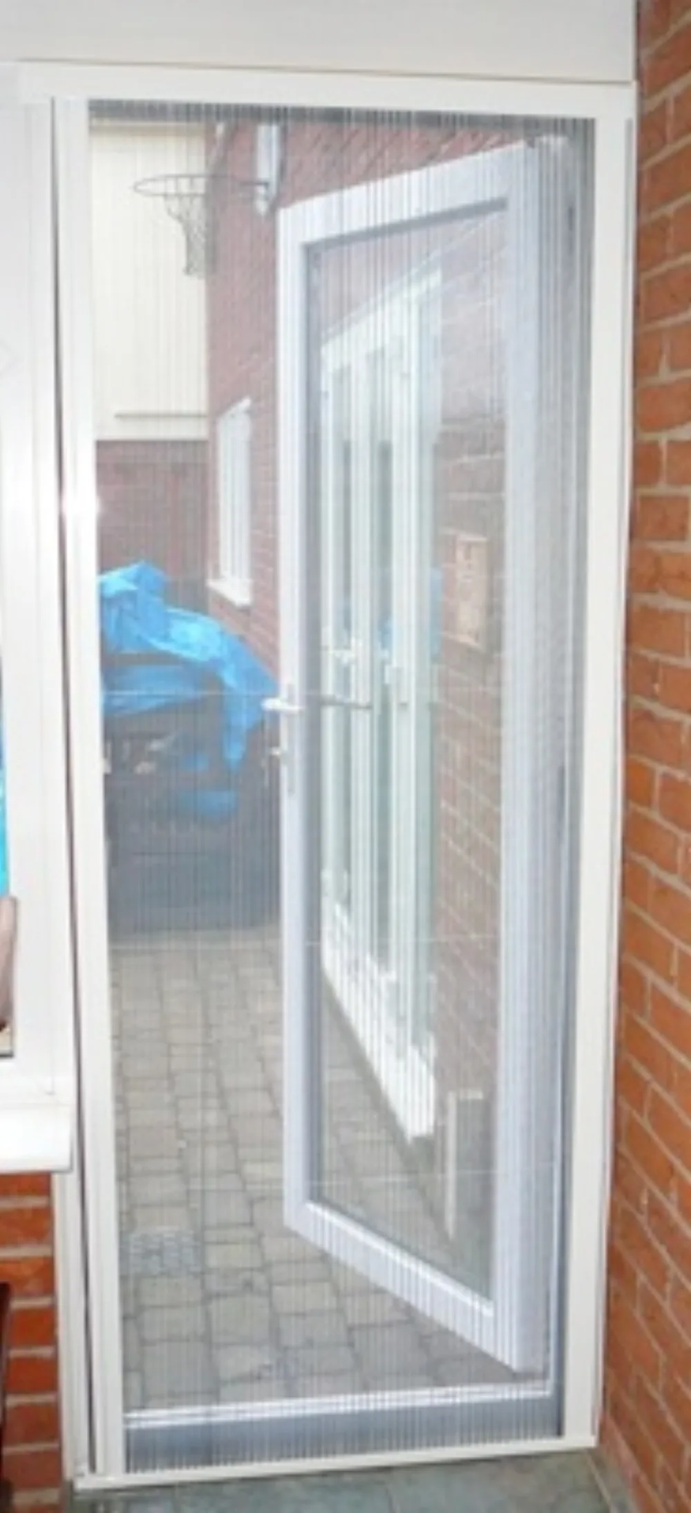 Single folding door fully drawn across