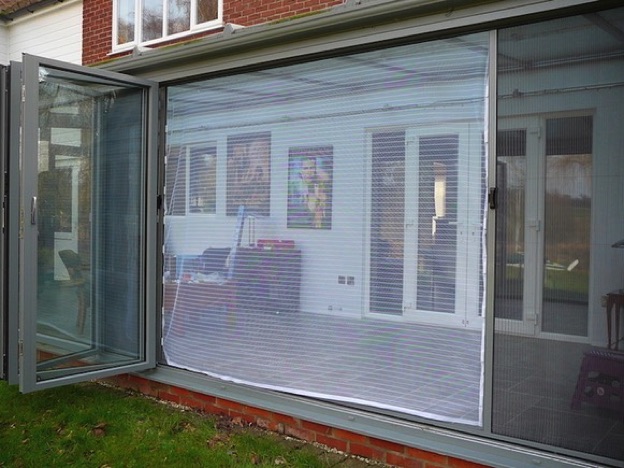 Flyscreen bi-fold to cover a large opening and protect from insects